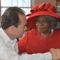 <p>Ivy WIlloughby, right, chats with Mayor Joe Ganim at the Bethany Senior Center in Bridgeport&#x27;s North End.</p>