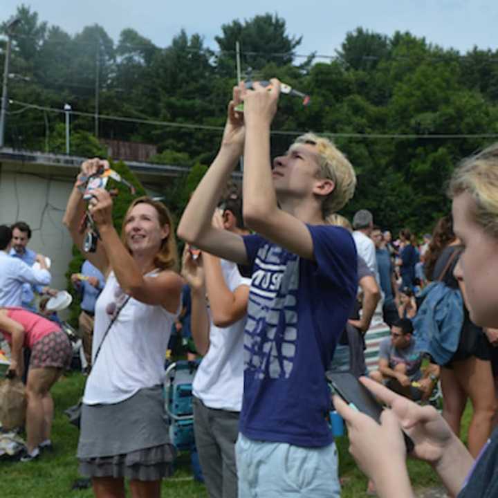 Hundreds converged on Rolnick Observatory in Westport for the solar eclipse.