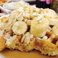 <p>Banana, almond, white chocolate waffles from the Country Pancake House in Ridgewood.</p>