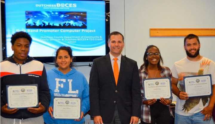 Students in the Youth Financial Literacy &amp; Computer Training Program are congratulated by County Executive Marc Molinaro.