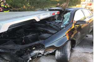 Driver With Sun In Eyes Slams Into Flatbed Of Tractor-Trailer On I-84