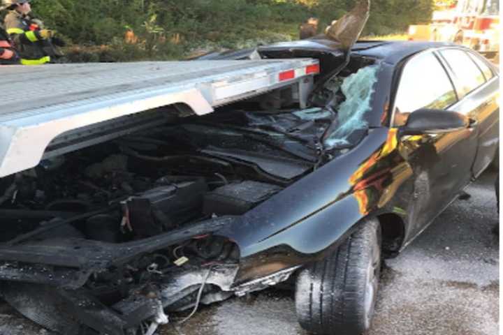 Driver With Sun In Eyes Slams Into Flatbed Of Tractor-Trailer On I-84