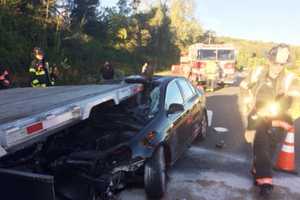 Driver With Sun In Eyes Slams Into Flatbed Of Tractor-Trailer On I-84