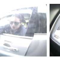 <p>A female suspect in a white Jeep Grand Cherokee (shown in photos above) cashed a forged check at a bank branch in Fishkill.</p>