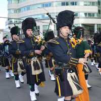 <p>The NYPD Emerald Society Pipe &amp; Drum Band makes its way down Atlantic Street.</p>