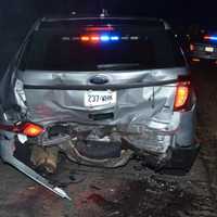 <p>A drunken driver rear-ended this Connecticut State Police SUV that was stopped to investigate a fatal crash on I-91 northbound in Cromwell.</p>