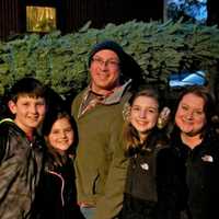 <p>A family getting their tree at Jones Family Farms in Shelton, Conn.</p>