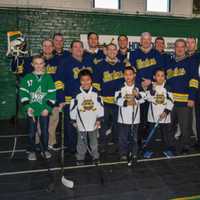 <p>Yonkers Mayor Mike Spano with the gear donated by the NHL Players&#x27; Association to help outfit the Yonkers Force hockey team.</p>