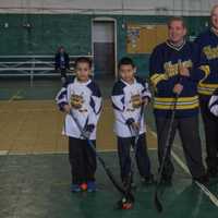 <p>Yonkers Mayor Mike Spano with the gear donated by the NHL Players&#x27; Association to help outfit the Yonkers Force hockey team.</p>