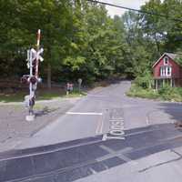 <p>A Metro-North train hit a car on the tracks on the Danbury Branch at Topstone Road in Redding late Tuesday.</p>