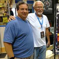 <p>West Nyack&#x27;s Scott Gunther with world-renowned artist Greg Hildebrandt and his new acrylic painting.</p>