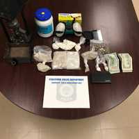 <p>Over a half-kilo of heroin and 160 grams of cocaine were seized, along with drug-packaging materials, Stratford police said.</p>