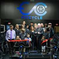 <p>Fairfield First Selectman cuts the ribbon at the grand opening of FitCycle Studio.</p>