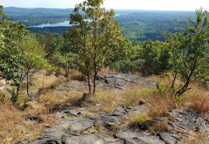 Firefighters are working to rescue an injured hiker from High Tor Mountain.