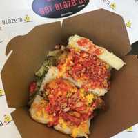 <p>Order a variety of chicken options topped with your choice of veggies and sauces at Blaze&#x27;D Chicken in Hackensack.</p>