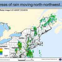 <p>A satellite image on Monday morning shows scattered showers moving northward.</p>