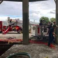 <p>First responders helped rescue a worker who was injured during demolition efforts at 860 Canal St. in Stamford.</p>