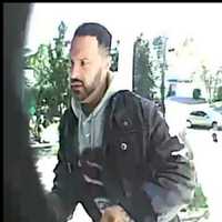 <p>One of the suspects who stole packages from a porch.</p>