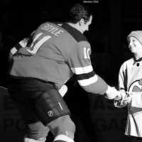 <p>Bennett Burgida meets NJ Devil Brian Boyle on the ice.</p>