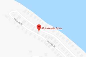 Boom Truck Tips Over, Nearly Crushing Westchester Home