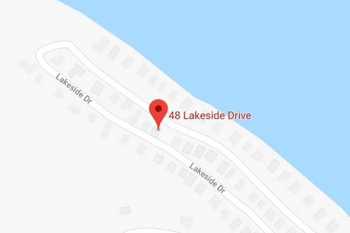 Boom Truck Tips Over, Nearly Crushing Westchester Home