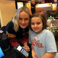 <p>Brie Larson and fan.</p>