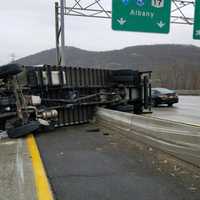 <p>I-287 was closed after a tractor-trailer flipped over the center median.</p>