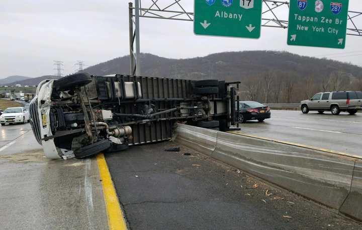 I-287 was closed after a tractor-trailer flipped over the center median.