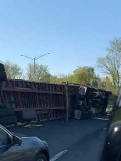 Overturned Tractor-Trailer Carrying Mulch Shuts Route 80 Exit Ramp In Paterson