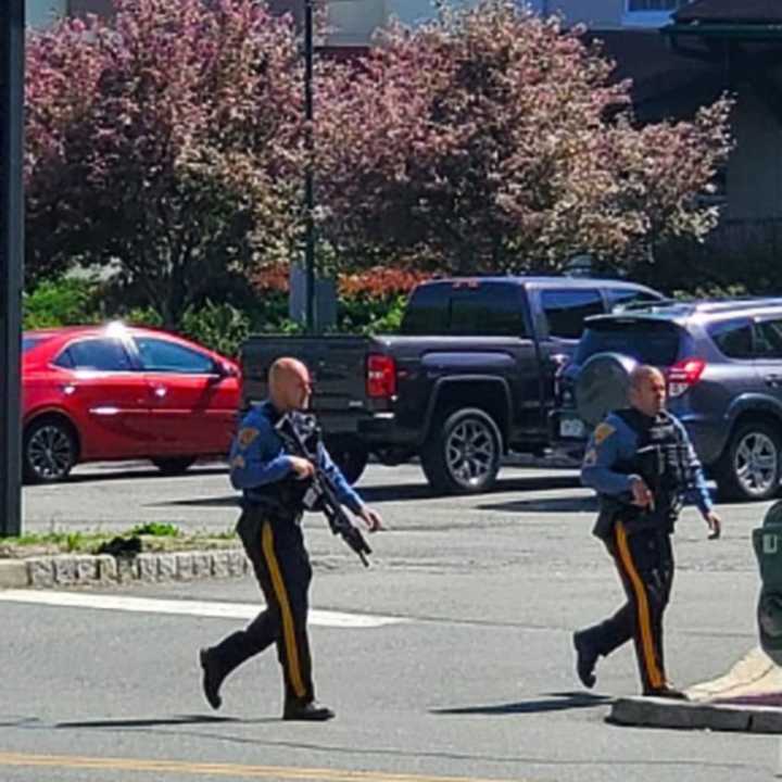 Police responded to reports of a suspicious individual possibly with weapons at Halsted Middle School in Newton Tuesday.