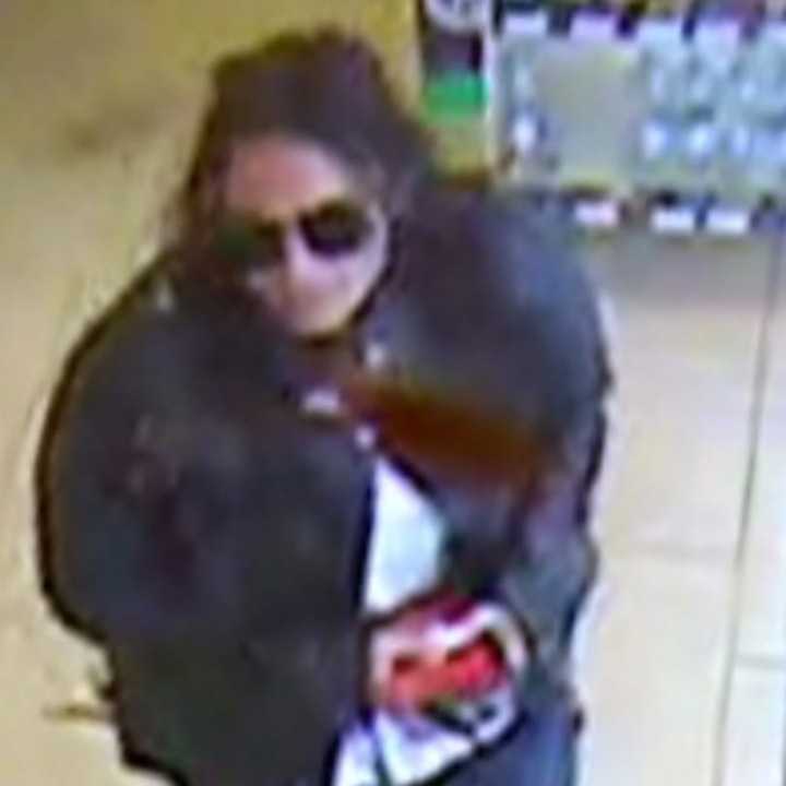 Woman suspected of using stolen credit cards at 7-Eleven in West Babylon (1000 Wellwood Avenue) on Wednesday, May 1