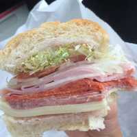 <p>Ham, salami, provolone, pepperoni, lettuce, tomatoes, onions, vinegar, oil, and pepper and salt sub from Esposito&#x27;s.</p>