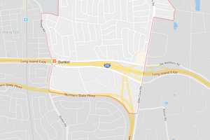 Woman Killed In Crash Between Audi, Mack Truck Pulling Semi-Trailer On LIE Service Road