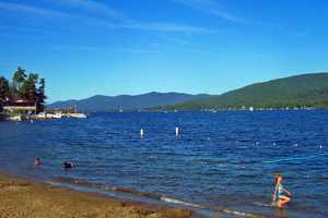 Couple Leaves Infant On Beach While Boating At Lake George, Police Say