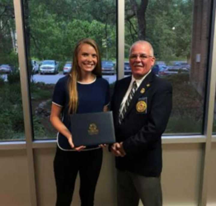 Emma Goodrow of Mahopac, recipient of the 2019 FASNY Gerard J. Buckenmeyer Volunteer Scholarship, pictured with Donald J. Farrell, the FASNY Sergeant-at-Arms