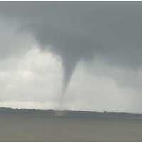 <p>A view of the tornado that touched down in eastern Suffolk County from Bellport Bay.</p>