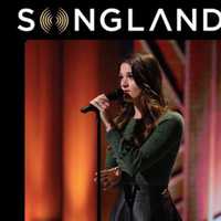 <p>DeRosa performs in front of Charlie Puth and others on &quot;Songland.&quot;</p>