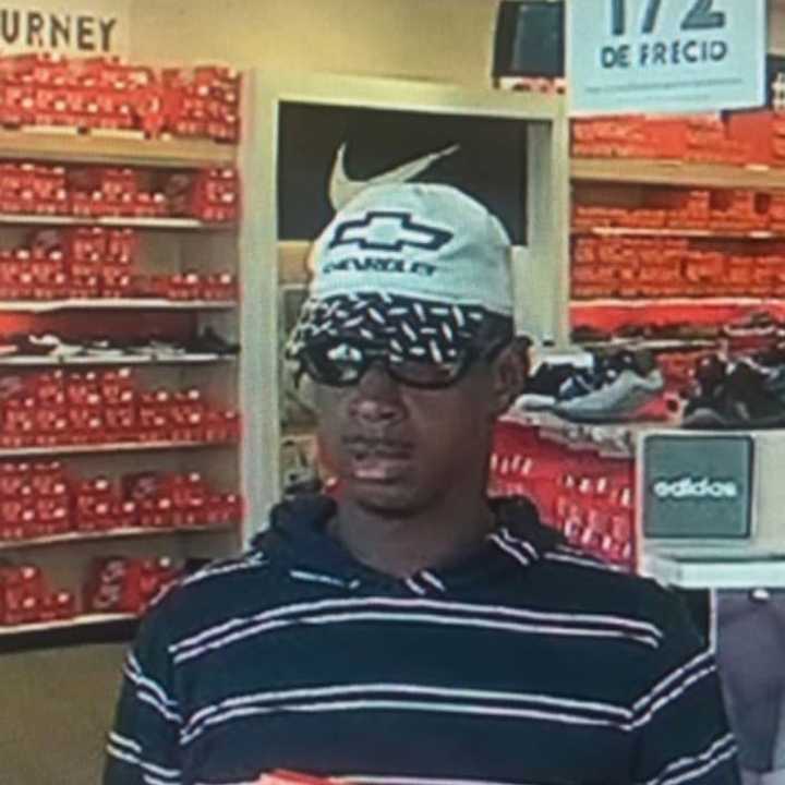 Police have released a surveillance photo of a man caught stealing sneakers from a store in Islandia.