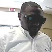 <p>Suffolk County Crime Stoppers and Riverhead Town Police are seeking the public’s help to identify and locate the man who made unauthorized withdrawals from a bank in Riverhead in August.</p>