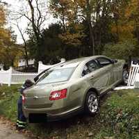 <p>The car careened through a white-picket fence in Hawthorne.</p>