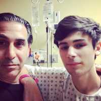 <p>Geraldo Iapicca and his son Antonio at the hospital.</p>