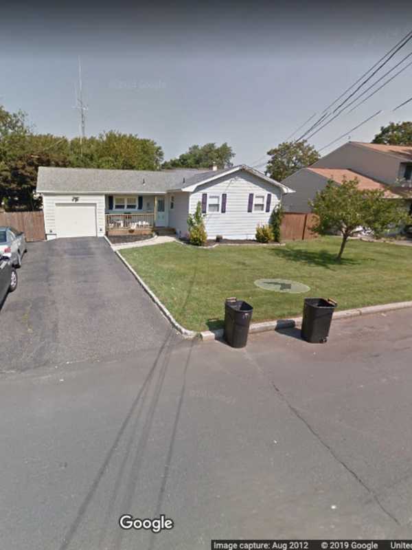 Family Of Four Rescued, Dog Dies In Long Island House Fire