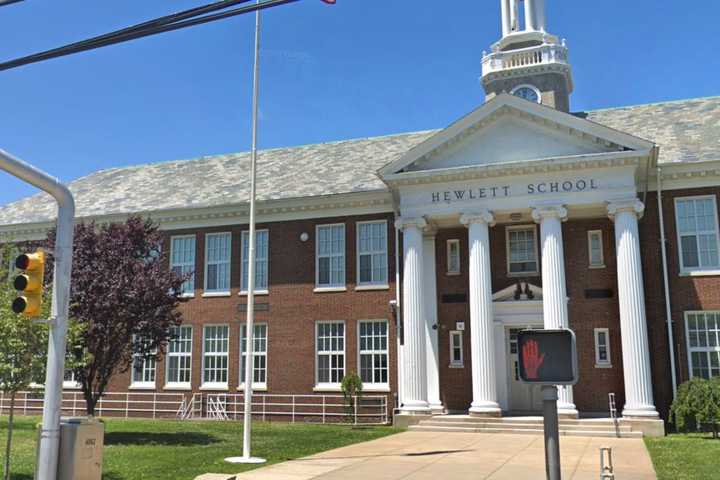 Long Island Woman Throws Rock Into Window Of School, Runs Through Hallways, Police Say