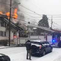 <p>A Nutley driver detailed how he jumped out of his car in an attempt to help the victims trapped in a burning house Saturday.</p>