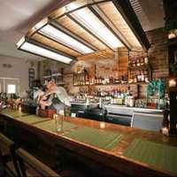 <p>The light fixture in The Kitchen Step in Jersey City is a custom piece made by Tribeca Grain.</p>