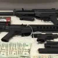 <p>Firearms and counterfeit cash</p>