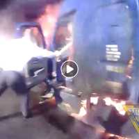 <p>The moment a New Jersey State trooper and lieutenant rescued a man from a burning truck on Route 287 in Bridgewater Township was captured in an action-packed video.</p>