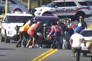 Neptune Township Police Thank Bystanders Who Helped Free Bicyclist Pinned Under SUV