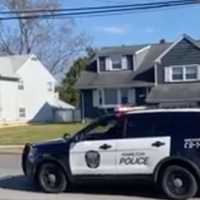 <p>Hamilton police arriving at Quinn&#x27;s house.</p>