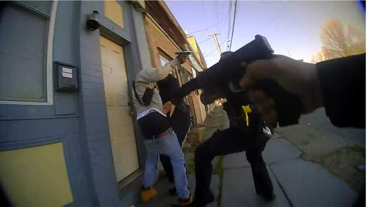 Orange County District Attorney David M. Hoovler and City of Newburgh Police Chief Douglas Solomon released images, including this one, from a body-worn camera that show a man brandishing a pistol as he fought with City of Newburgh police officers.